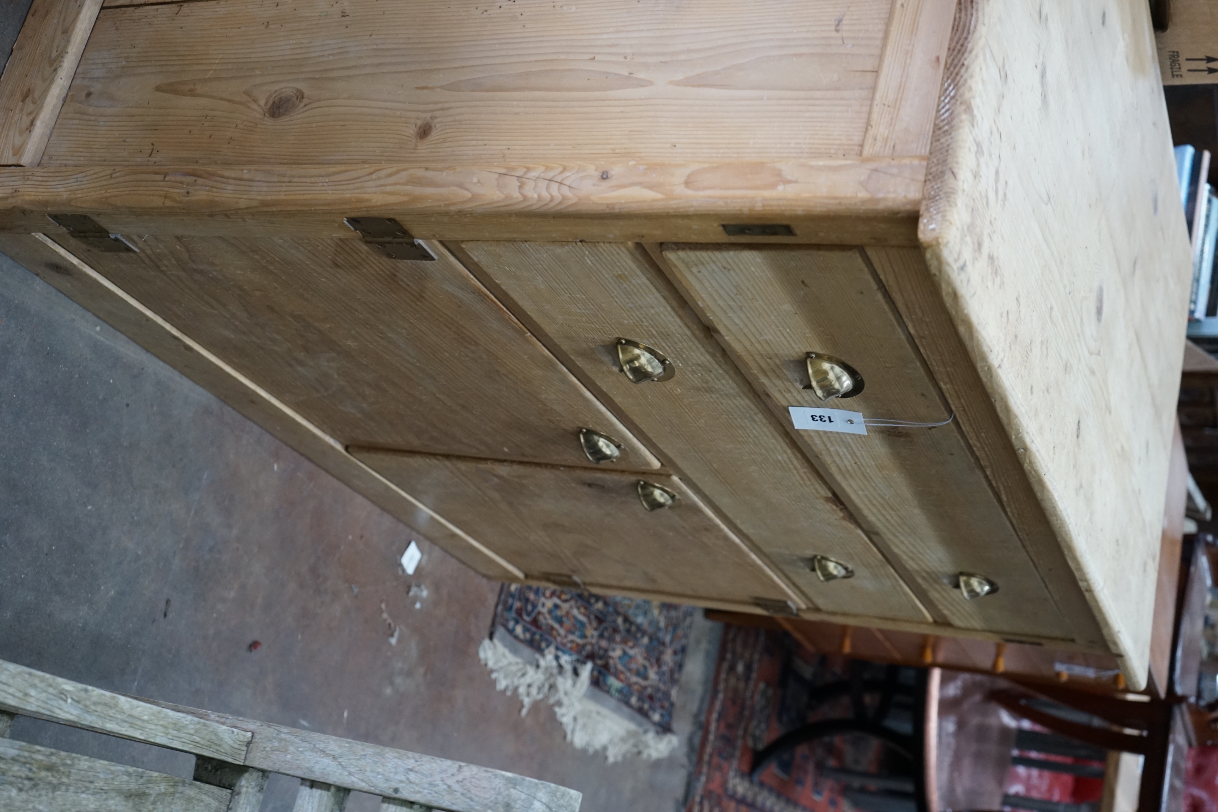 A 19th century pine two drawer side cabinet, width 124cm depth 63cm height 100cm